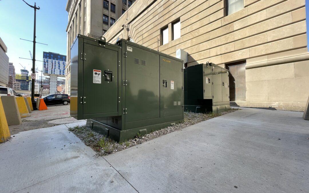 Crews install equipment in Detroit to improve reliability.