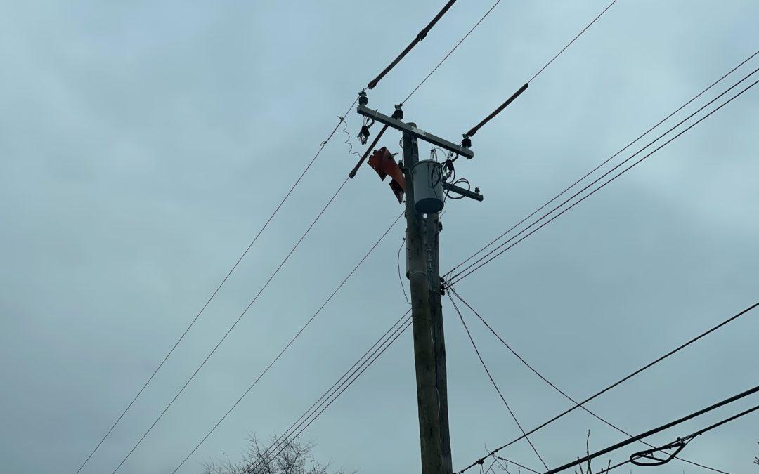 DTE crews upgrade a utility pole in Ann Arbor
