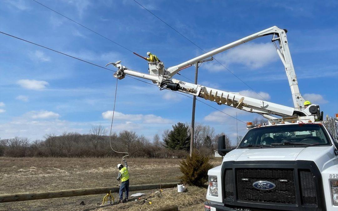 DTE crews install new poles to improve reliability