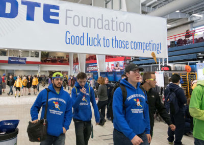 Teams enter the pit under DTE Foundation banner at FIRST in Michigan Championship 2019